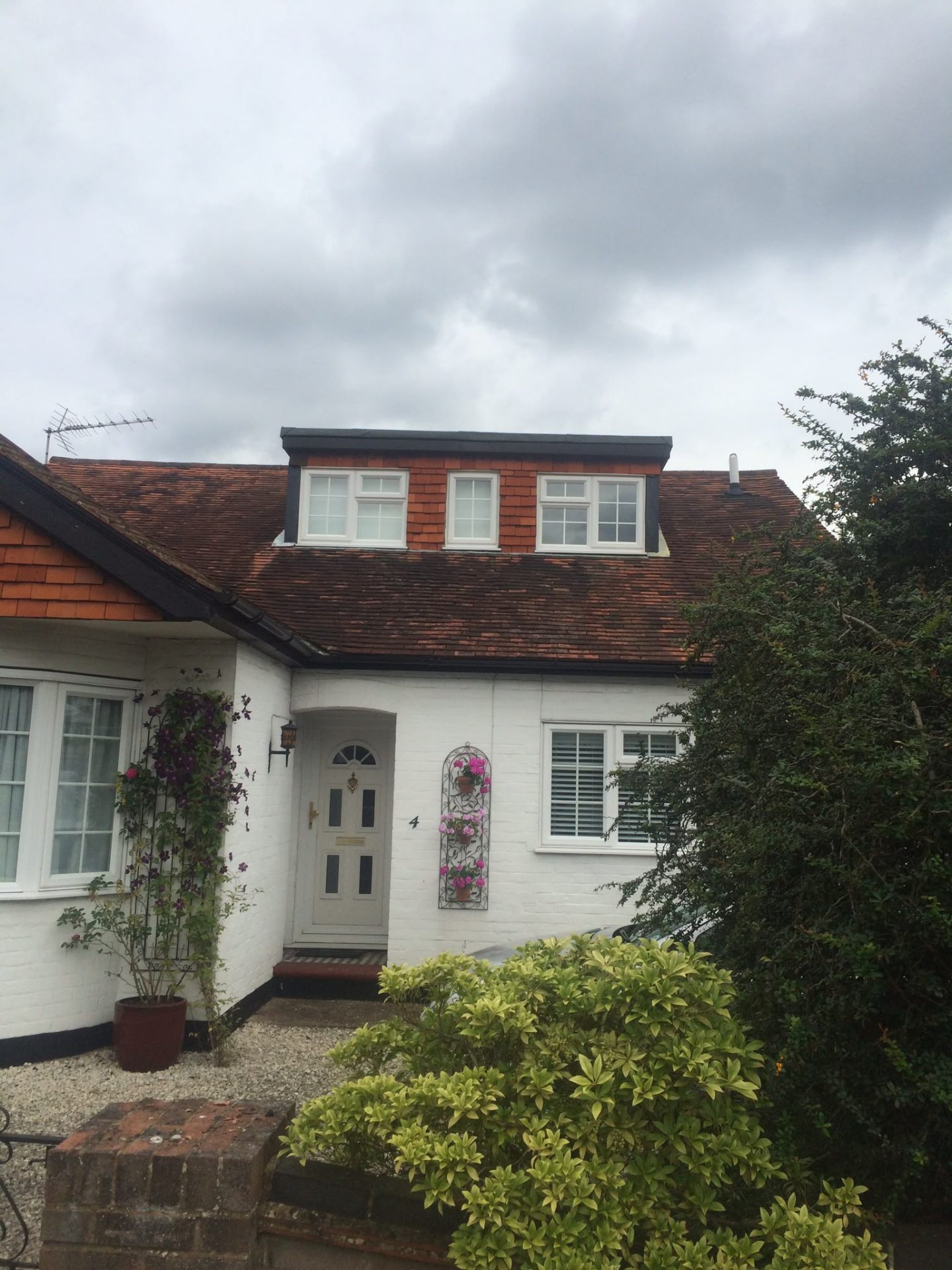 Re-roof with dormer, new membrane and tiles
