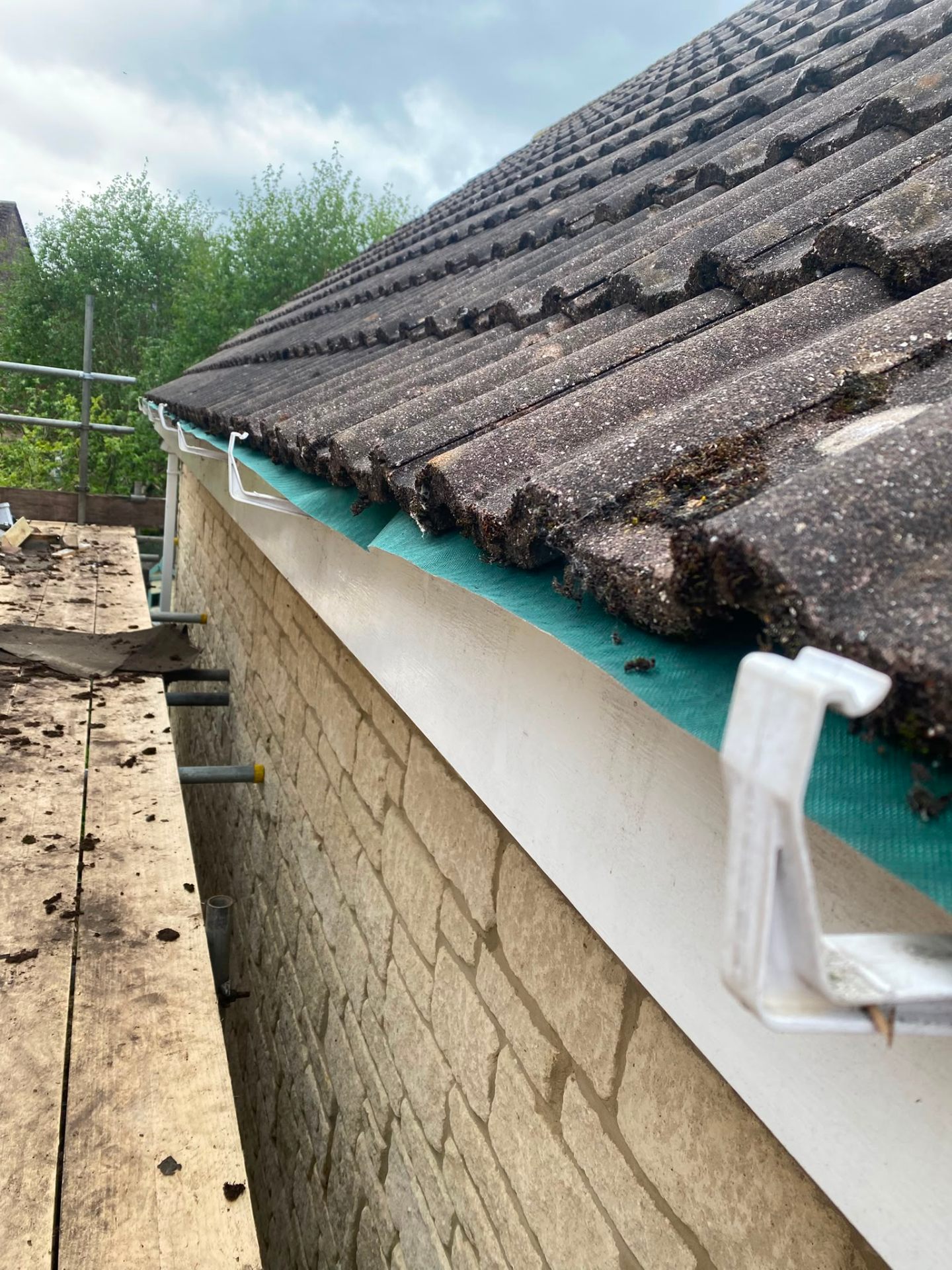 Eaves felt and new gutter brackets ready for guttering