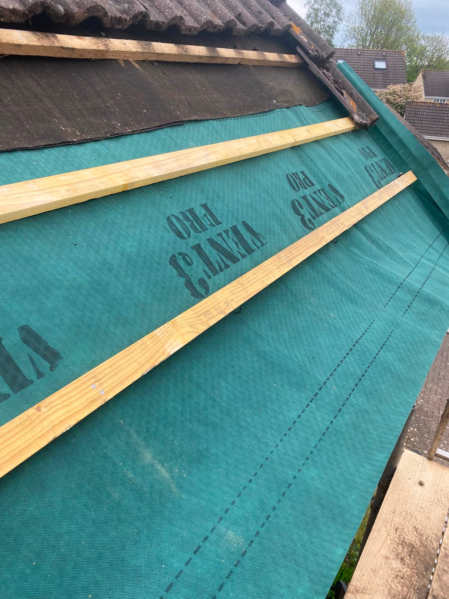 Roofing membrane beneath tiles being fitted in Wiltshire