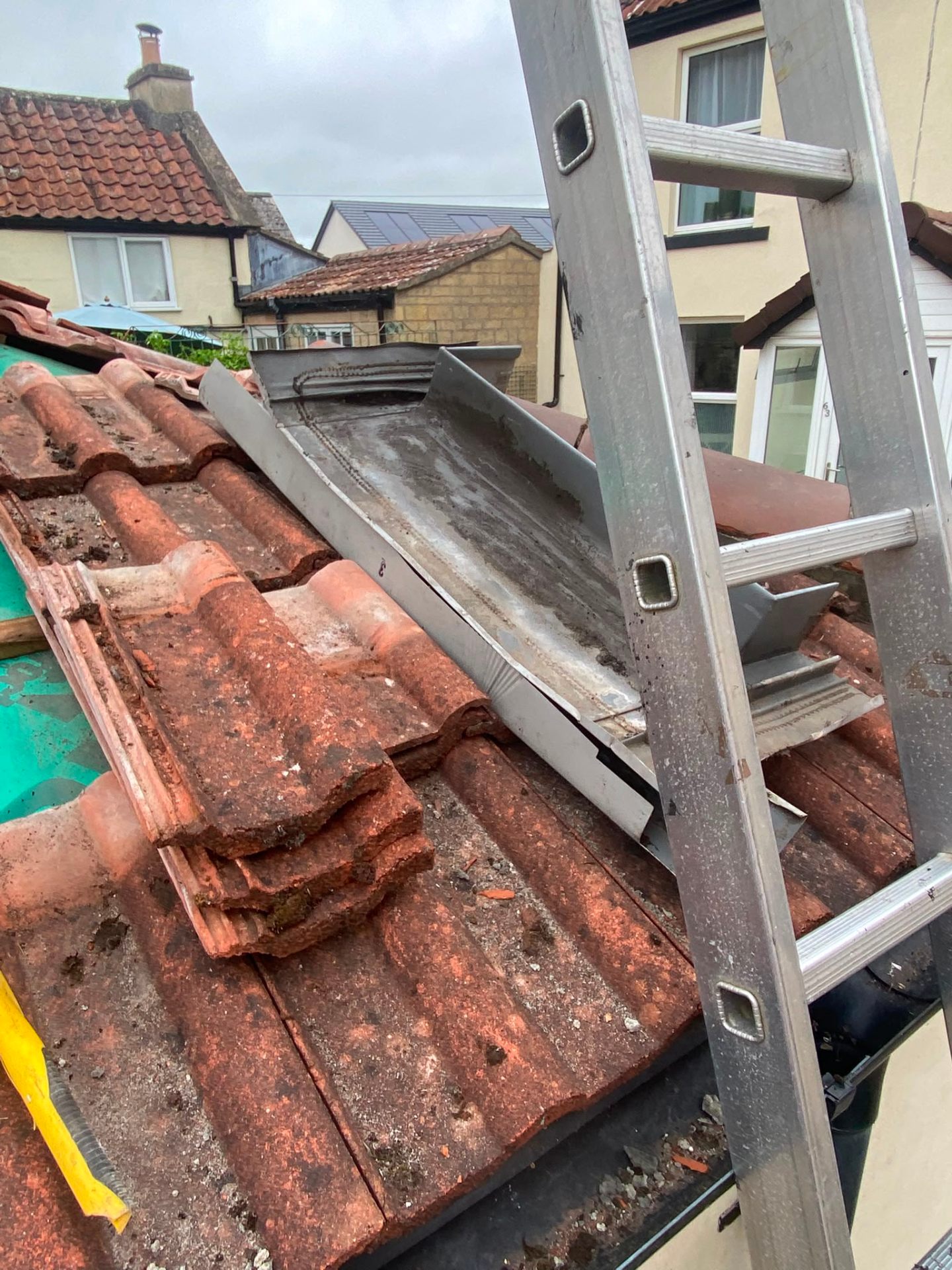 Roof valley strip showing membrane beneath tiles