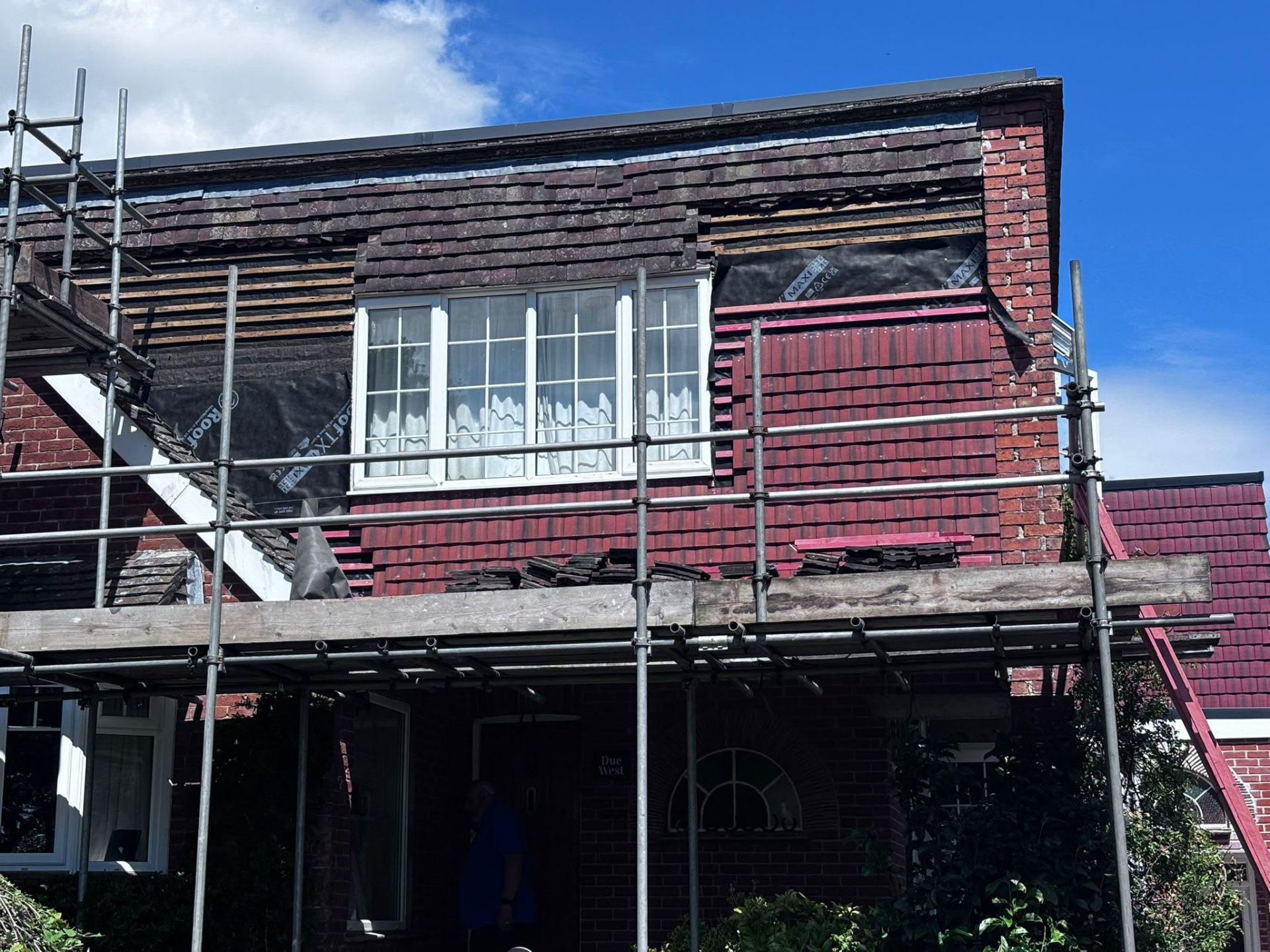 Vertical slate tiling on a gable end